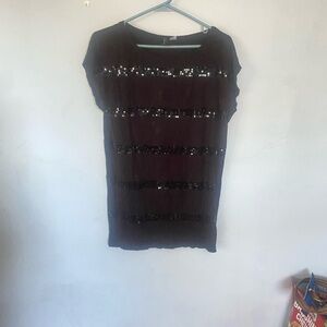 Slinky black T with sequins. $5!!!! Size 10